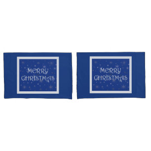 Frohe Weihnachten auf Blau mit Schneeflocken Kissenbezug
