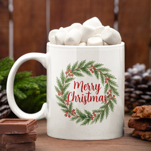 Frohe Weihnachten auf rotem grünem Stechpalmenkran Kaffeetasse