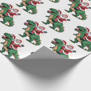 Frohe Weihnachten Der Weihnachtsmann reitet auf ei Geschenkpapier