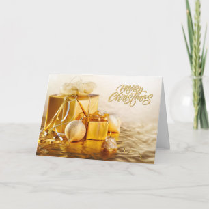 Frohe Weihnachten Goldene Ornamente und Geschenkbo Karte
