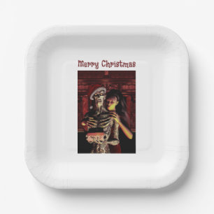Frohe Weihnachten. Lustiges Skelett mit Frau Pappteller