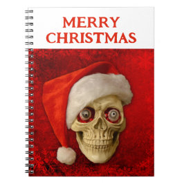 Frohe Weihnachten. Totenkopf mit Santa Hut Notizblock