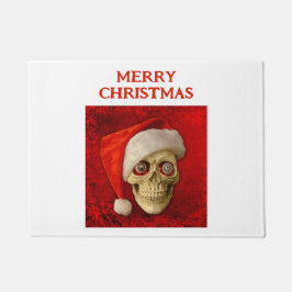 Frohe Weihnachten. Totenkopf mit Weihnachtsmannmüt Fußmatte