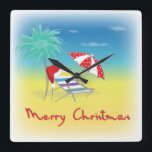 Frohe Weihnachten, Weihnachtsmannmütze, Palme Tree Quadratische Wanduhr<br><div class="desc">Frohe Weihnachten mit Weihnachtsmannmütze,  Palme Tree,  Beach Umbrella und Chair Illustration von Inge Lewis. Finden Sie weitere passende Artikel im ingeinc.com Store.</div>