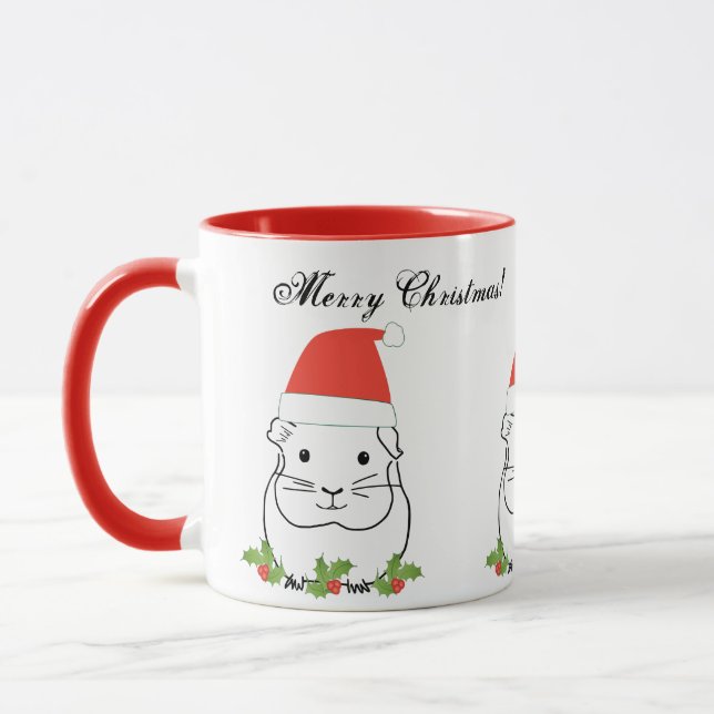 Frohe Weihnachts-Guinea Schweinchen in einer Weihn Tasse (Links)