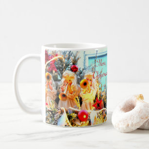 Frohe Weihnachtsangels trompelnd Kaffeetasse