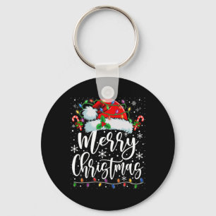 Frohe Weihnachtsbeleuchtung Red Weihnachtsmannmütz Schlüsselanhänger