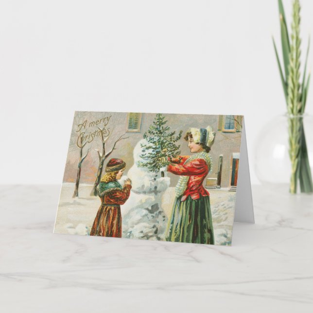 Frohe Weihnachtsfrau, Kind und Schneemann Feiertagskarte (Vorderseite)