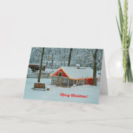 Frohe Weihnachtskarte mit einer Schneefarm-Szene Feiertagskarte