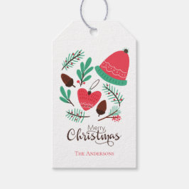 Frohe Weihnachtsmütze und Pinecones Geschenkanhänger