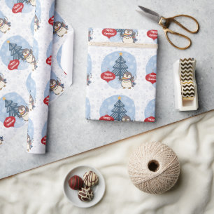 Frohe Weihnachtspinguin und Schneeflocken Geschenkpapier