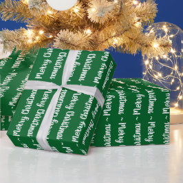 Frohe Weihnachtstypografie in Weiß auf grünem Gesc Geschenkpapier