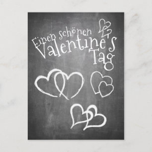 Frohen Valentinstag auf einer Kreidetafel Feiertagspostkarte