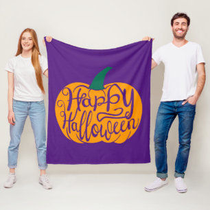 Fröhliche Halloween-Schrift auf geschnitztem Kürbi Fleecedecke