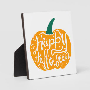 Fröhliche Halloween-Schrift auf geschnitztem Kürbi Fotoplatte