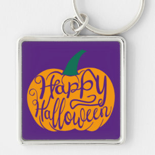 Fröhliche Halloween-Schrift auf geschnitztem Kürbi Schlüsselanhänger