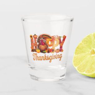 Fröhliche Truthähne zum Erntedankfest fallen Schnapsglas