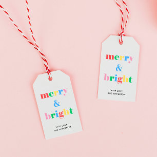Fröhliche und helle bunte Typografie Weihnachten Geschenkanhänger