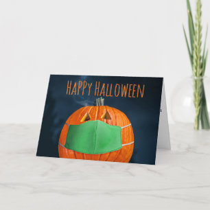 Fröhlicher Halloween Pumpkin in Coronavirus Gesich Karte