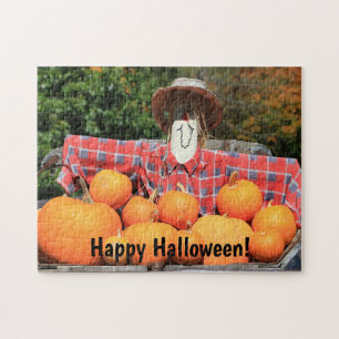 Fröhlicher Halloween-Scarecrow und Pumpkins Famil