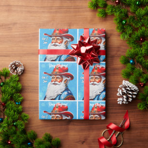 Fröhlicher Weihnachtsmann in einem Western Hut Wei Geschenkpapier