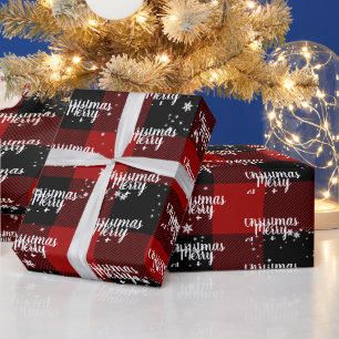 Fröhlicher Weihnachtstext in Schneeflocken auf Kar Geschenkpapier