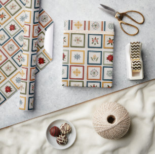 Fröhliches Patchwork aus Weihnachtselementen Geschenkpapier