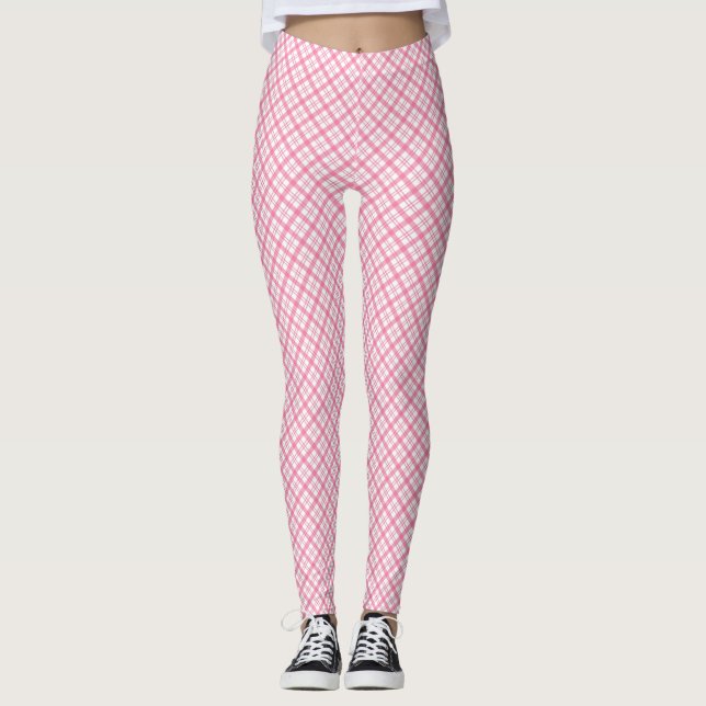 Front and back views of pink plaid leggings worn  (Devant)