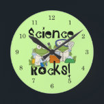 Frosch-Wissenschafts-Felsen Runde Wanduhr<br><div class="desc">Zwei Frösche mit Labradormänteln und die Sicherheitsschutzbrillen,  die Labradorexperimente auf Wissenschafts-Felsen-T - Shirts,  Hoodies,  Knöpfen,  Karten,  Tassen,  Magneten,  Schlüsselanhänger,  Zeitschriften,  mousepads und anderen Wissenschafts-Felsen Kleid und Geschenke tun,  die sicher sind,  einig Lachen zu erhalten und schaut an zweiter Stelle!</div>
