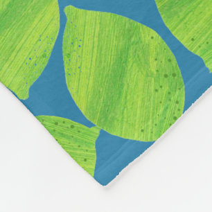 Fruchtige grüne Grenzen auf blauem Hintergrund, um Fleecedecke