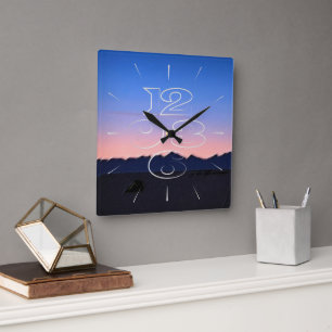 Frühling im Winter Quadratische Wanduhr