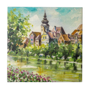 Frühling in der kleinen Stadt auf dem Fluss Fliese