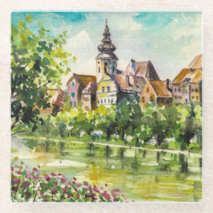 Frühling in der kleinen Stadt auf dem Fluss Glasuntersetzer