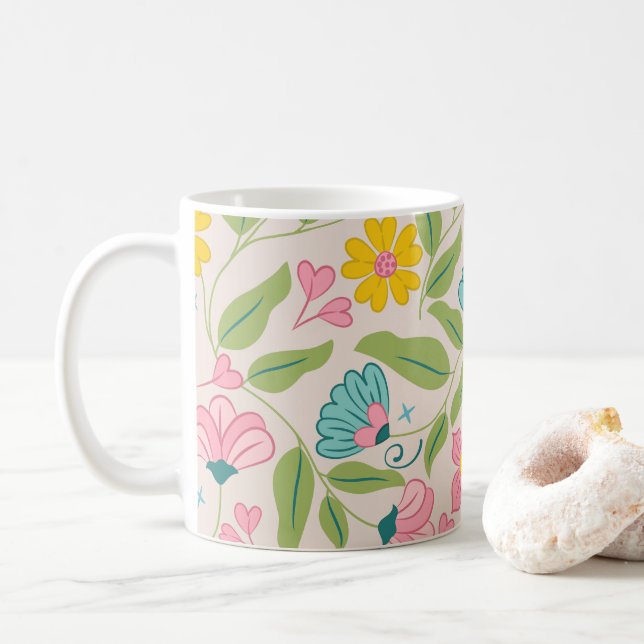 Frühlingsblumenmuster auf Rosa Kaffeetasse (Mit Donut)