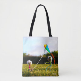 Fubby's die samen spelen met een vlieger. tasche