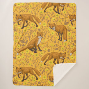 Füchse und Buttercups auf Orange Sherpadecke