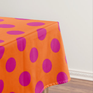 Fuchsia-Polka-Punkte auf Orange Tischdecke
