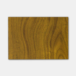 Fügen Sie Text hölzernem Hintergrund hinzu Post-it Klebezettel