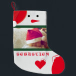 Fun Snowman Ihr Foto Name Niedlich Baby Kleinkind  Kleiner Weihnachtsstrumpf<br><div class="desc">Adorable niedliche Gestaltung mit einem Weihnachtsschneemann mit einem roten Hut des Weihnachtsmannes,  zwei individuellen Fotos,  dem Namen Ihres Kindes,  alles auf einem großen Weihnachtsfeiertag Strumpf,  um auf dem Mantel an Weihnachten zu hängen. Der Hintergrund ist ein schneeweißer gestrickter Hintergrund mit schneebedeckten weißen Strickherzen.</div>