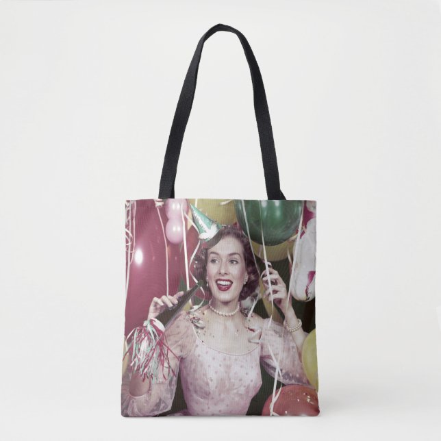 Fünfzigerjahre glückliche Frau im Party-Kleid am Tasche (Vorderseite)