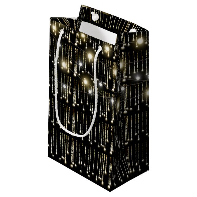 Funkelleuchten auf schwarz kleine geschenktüte (Vorderseite Schrägansicht)