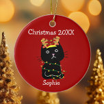Funny Black Cat Christmas Drawing Monogram Red Keramik Ornament<br><div class="desc">This cute cat Christmas ornament features a drawing of a black kitten wrapped in Xmas lights. Customize this pretty red holiday ornament for a friend or family member who loves their kitty. Monogram their name in white under the funny feline.</div>