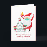 Funny Cartoon Santa mit Maske | Christmas | Covid Feiertagskarte<br><div class="desc">Auf dieser lustigen Urlaubskarte stehen ein paar geschäftige Elfen, die eine Reihe Toilettenpapier aufstapeln, während der Weihnachtsmann sie mit seiner Glocke anfeuert. Die Nachricht unten lautet "Holiday Cheer während eines Crazy Year" in einem roten Schriftart auf hellweißem Hintergrund. Die Farben sind grün, rot, braun und rosa. Ein weiterer Elf schmückt...</div>