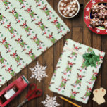 Funny Christmas Calico Cat Geschenkpapier<br><div class="desc">Niedliche Kalico-Katze gekleidet in Weihnachtsbeleuchtung,  gestopfte Antlers,  Weihnachts-Weihnachtsmannmütze und große grüne Box gegen. Hintergrund von hellgrün</div>