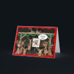 Funny Christmas Cards | Rudolph Reindeer Games Feiertagskarte<br><div class="desc">Versenden Sie dieses Jahr Lacher und guten Beifall an Familie und Freunde, indem Sie ihnen in dieser Weihnachtszeit Ihre eigenen personalisierten Weihnachtskarten schicken! Die einzigartige Abbildung von Raphaela Wilson zeigt einen Haufen Rentiere des Weihnachtsmannes, der in einer Scheune zeichne.. Und was wird gezeichnet? Ole St. Nicolas in einem Käfig.. und...</div>