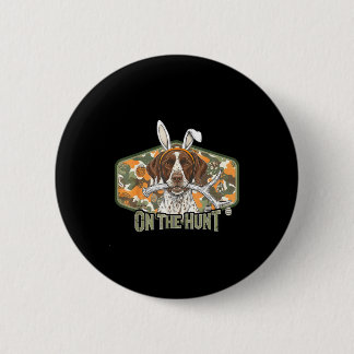 Funny easter labrador retriever on the hunt bunny button