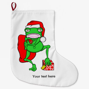 Funny Frog trägt einen Red Santa Claus Hat Großer Weihnachtsstrumpf