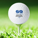 Funny Golf Balls 60. Geburtstagsparty Mit Monogram Golfball<br><div class="desc">Ihr Golfer, der 60 Jahre alt wird, wird von diesen personalisierten Golfballs zum Lachen kommen. Enthält ein Design mit Text, der "60 Jahre und immer noch schwingen" lautet. (Sie können die Zahl in jedes Jahr ändern.) Personalisieren Sie Ihre Daten mit mit Monogramm Initialen, Namen oder Datum. Ein idealer Ort für...</div>
