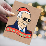 Funny Ho Es ist Präsident Joe Biden Weihnachten Postkarte<br><div class="desc">"HO HO,  ES IST PRÄSIDENT JOE!" Dieser politische Spaß auf der Postkarte bietet einen Cartoon des designierten Präsidenten,  der sich in Sonnenbrillen,  einem tiefblauen Mantel,  einem glänzenden Lächeln und einer Weihnachtsmannmütze mit einem Leseband,  in dem "HO HO HO,  IT S PRESIDENT JOE!" steht.</div>