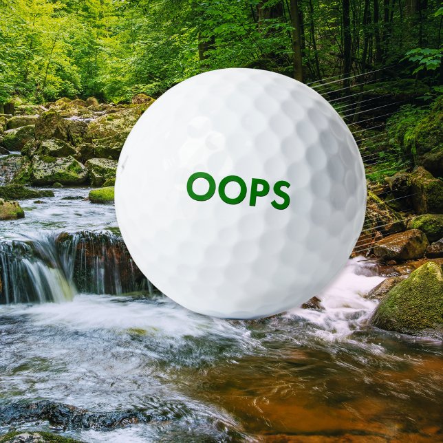 Funny 'Oops' Spaß Joke Quirky Novelty Golfball (A funny novelty golf ball with 'Oops' caption in green on a classic white background)